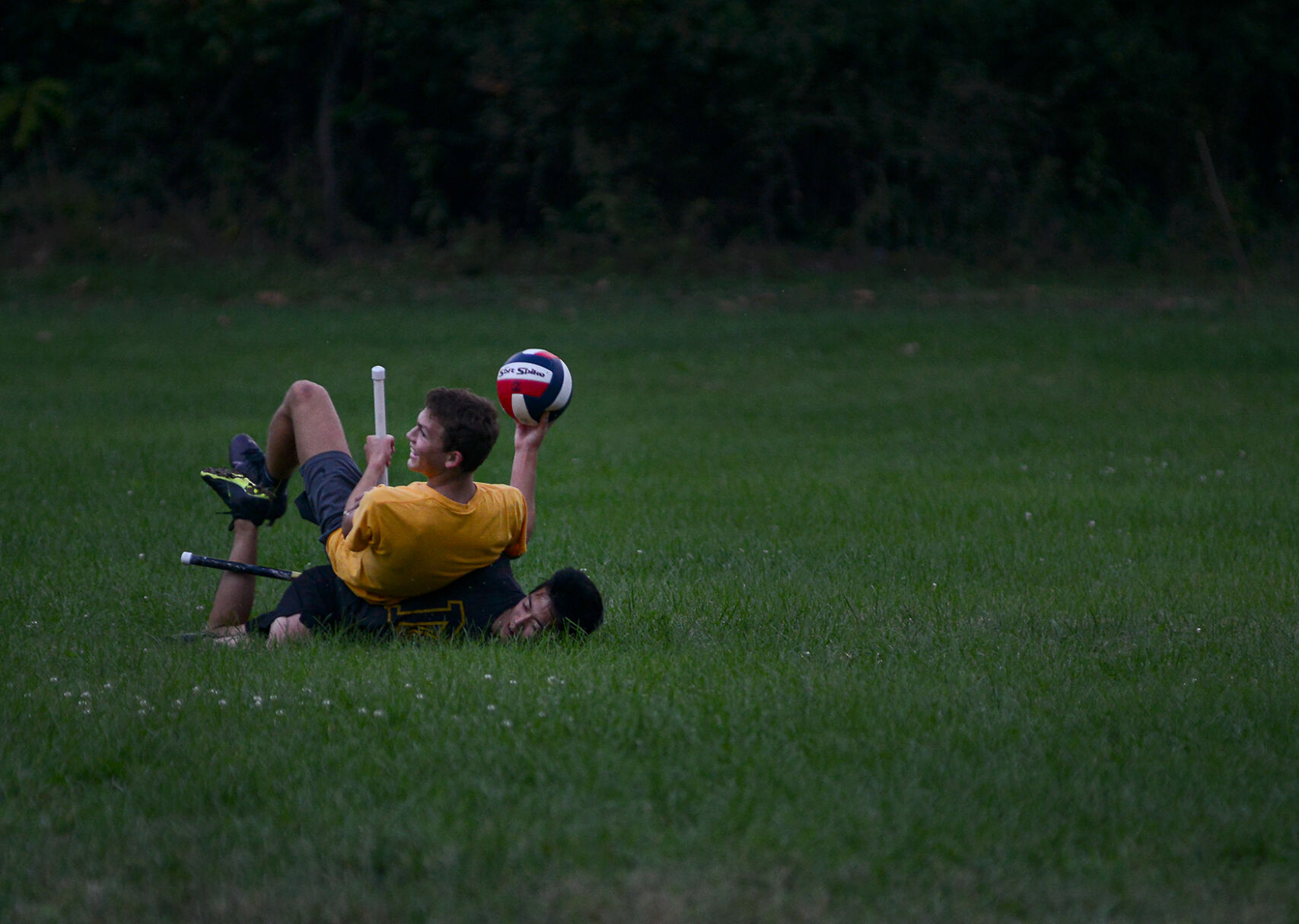 Evan Danaher tackles Grant Himmelmann during quidditch practice